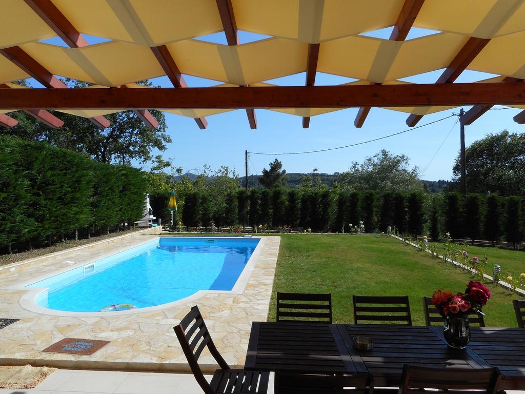 Villa Poulades Gouvia Exterior foto